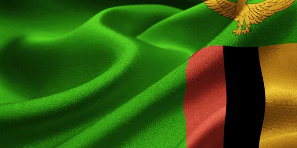 64501816 - image of zambia flag blowing in the wind